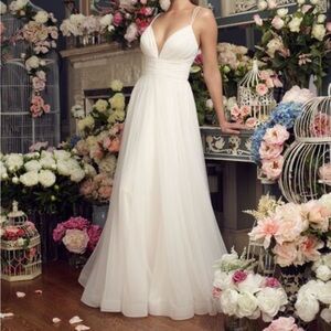 Altered Mikaela bridal dress. Never worn. Altered to fit 5’ 4” and 28” waist